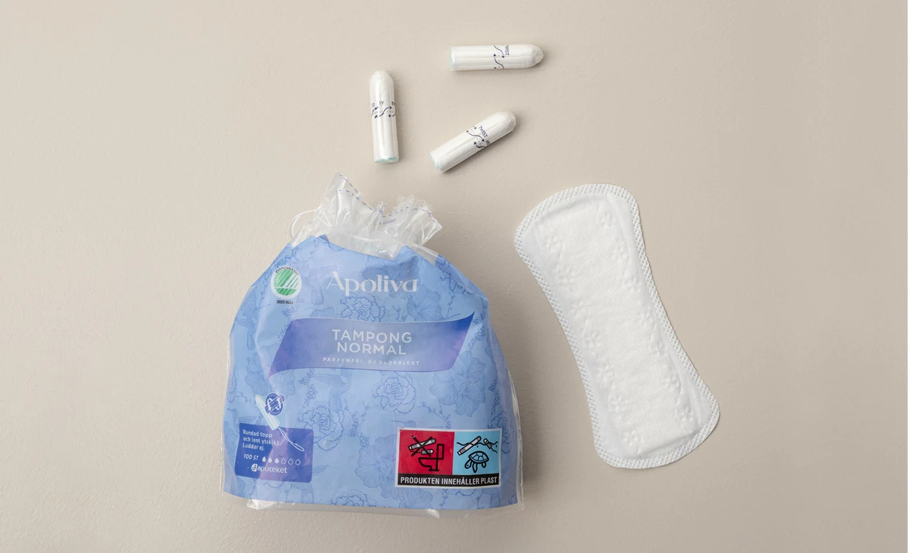 Apoliva mensskydd: tamponger och trosskydd på beige bakgrund.