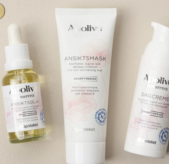 Apoliva Sensitive: ansiktsolja, ansiktsmask och dagkräm på beige bakgrund.