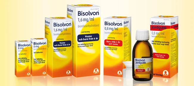 En samling av Bisolvonsprodukter mot en gul bakgrund med både ytterförpackningar och en flaska. 