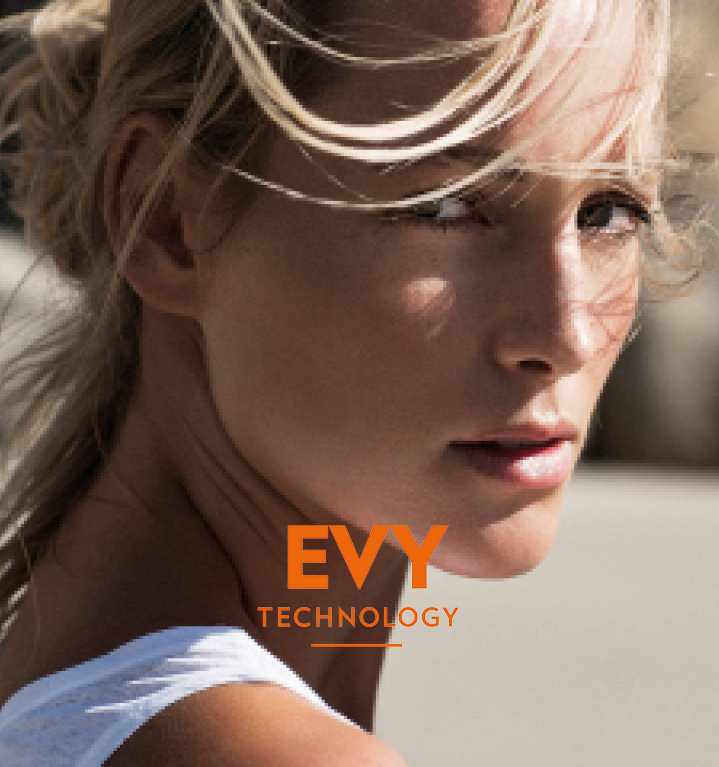 En kvinna med seriös blick. Text på bild lyder: EVY technology.