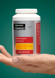 En hand visar upp kosttillskottet "FORMULA" från apoteket.
