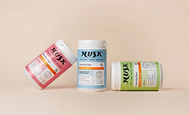 Kosttillskott från Husk innehållande fibrer som kan förebygga magbesvär.